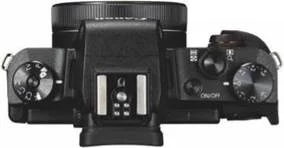 Canon has included plenty of controls on the small, slimline camera body, including top-plate dials and a ring aound the lens